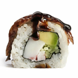 Uramaki con polpa di granchio, avocado e cetrioli ricoperto con anguilla e salsa teriyaki.